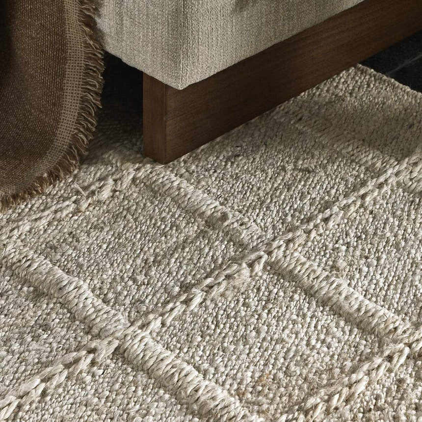 Close-up of Four Hands Grid Jute Rug - Bleached Grid Jute, showing natural fiber texture and woven grid pattern. Styleshot