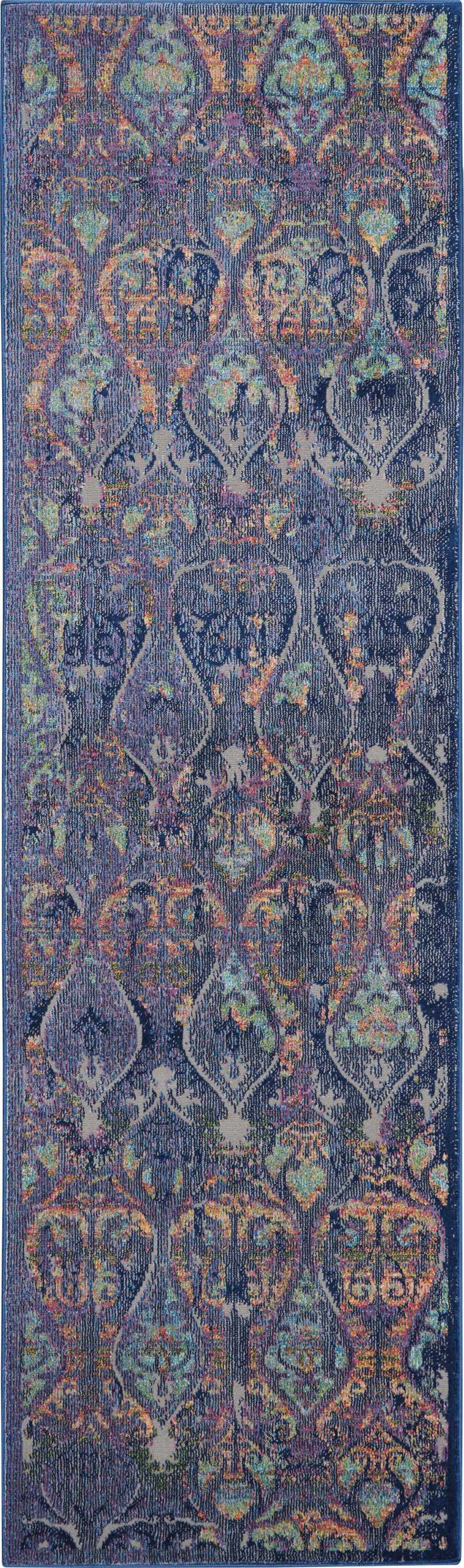 Close-up of the Nourison Ankara Global Navy Multicolor rug. Bohemian pattern with navy, orange, purple, and teal accents.