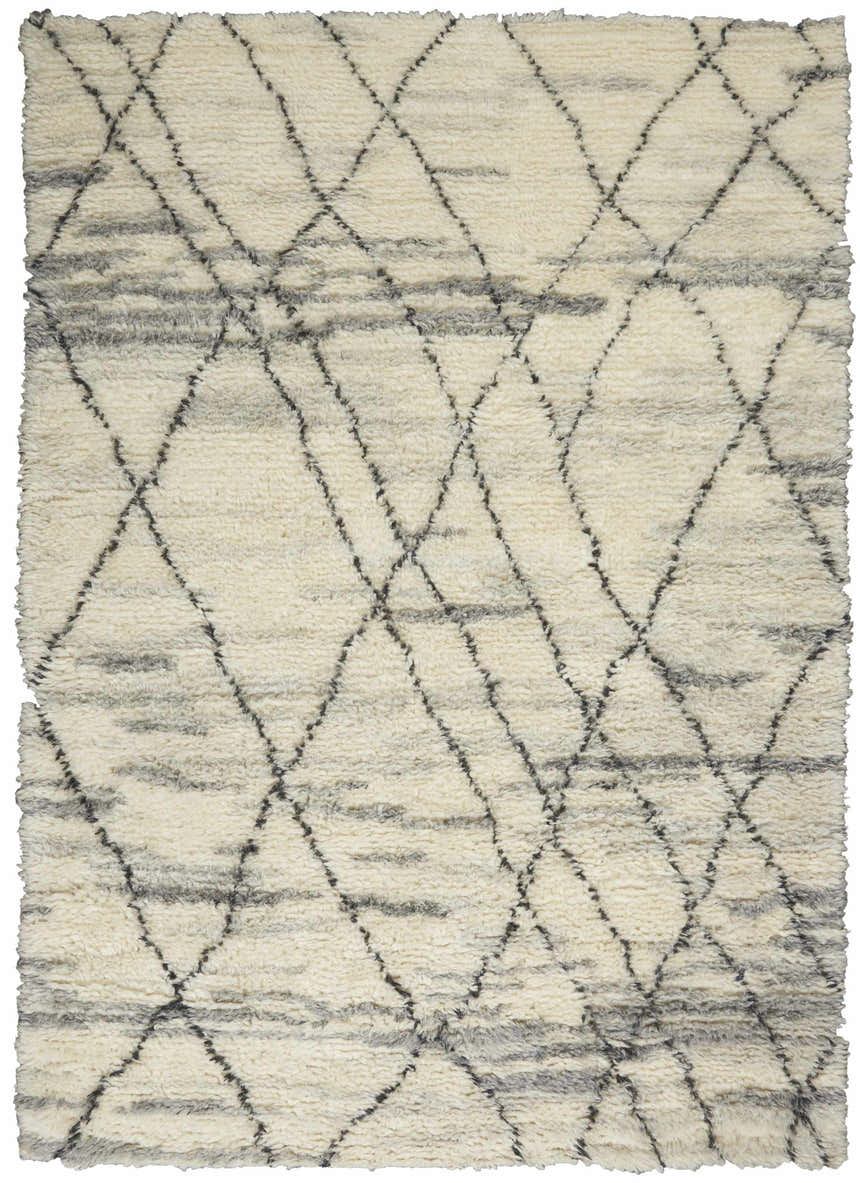 Close-up of the Calvin Klein San Antonio Ivory Multicolor Moroccan shag rug with a diamond pattern and wool texture.