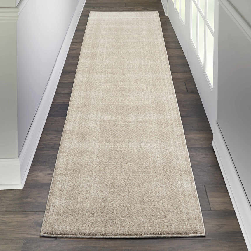 Hallway scene with a Nourison Palermo Beige runner rug on dark wood floors.