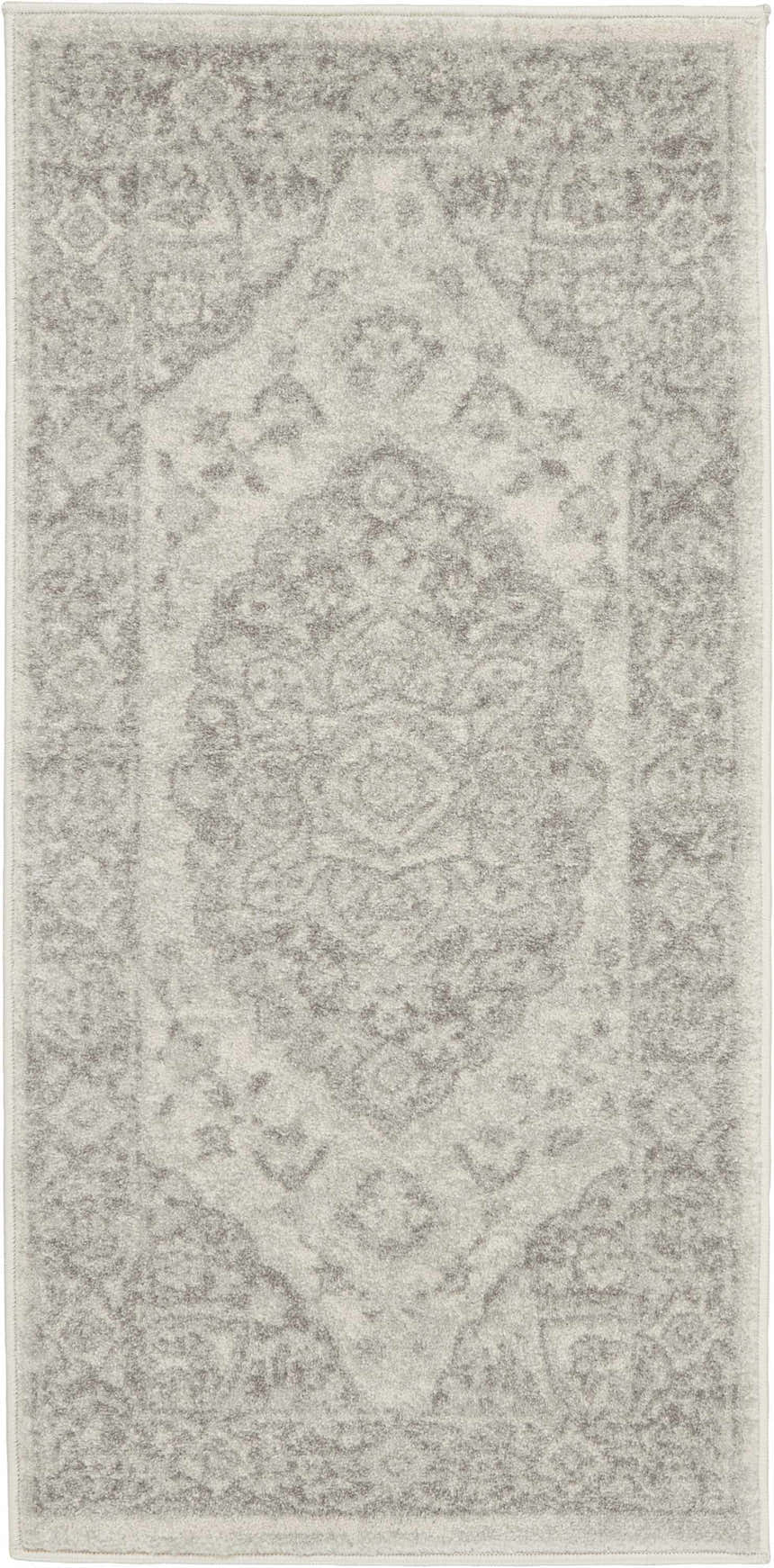 Close-up of Nourison Tranquil Ivory Grey Vintage Area Rug showing the distressed pattern and soft texture.