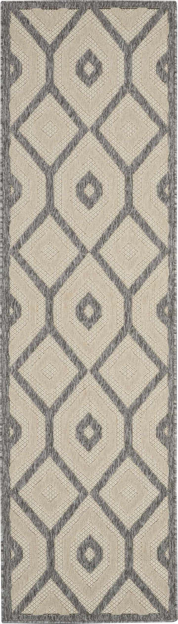 Close-up of the Nourison Cozumel Cream Modern Area Rug, featuring a geometric diamond pattern in cream and gray.