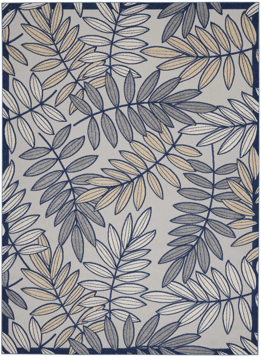 Close-up of the Nourison Aloha Ivory Navy Tropical Area Rug featuring a leaf pattern in chestnut, ivory, and navy.