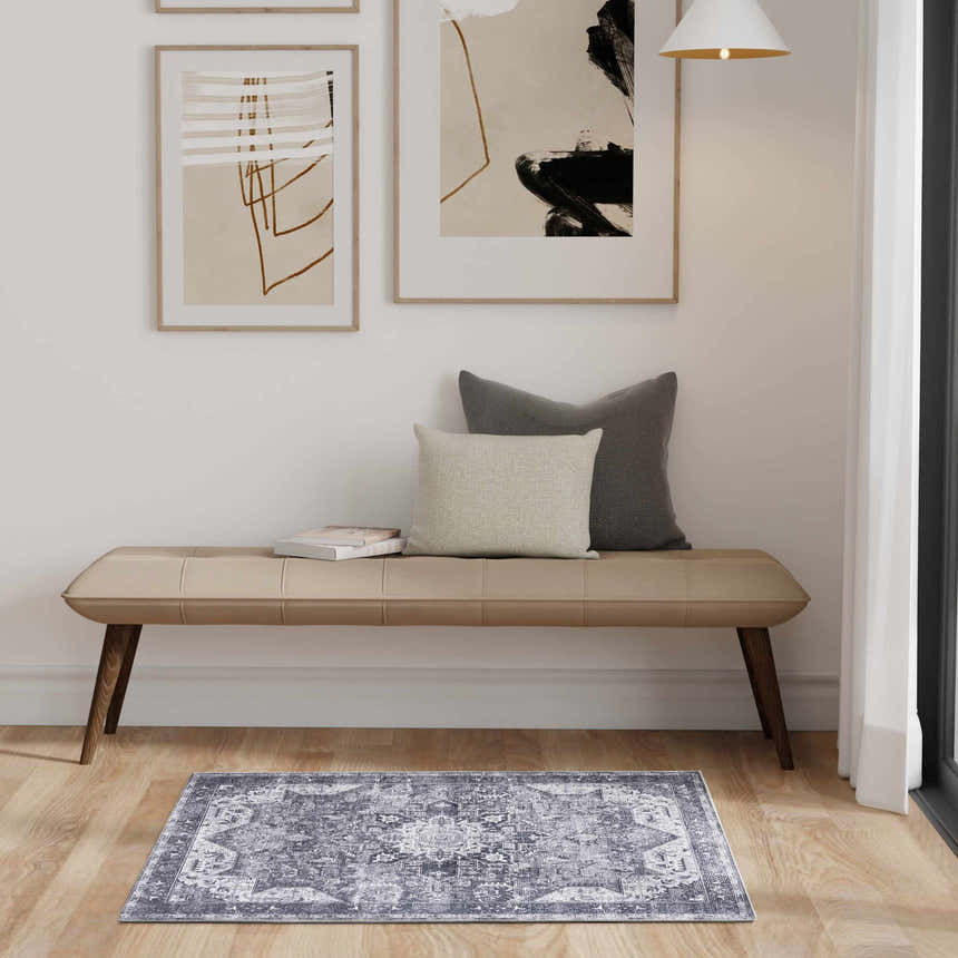 Entryway with bench and Nourison Charcoal Grey Vintage Washable Area Rug.