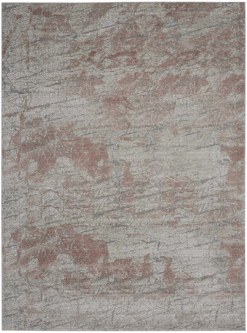 Close-up of Nourison Rustic Textures Light Grey Rust rug. Modern design with light gray and rust colored abstract pattern.