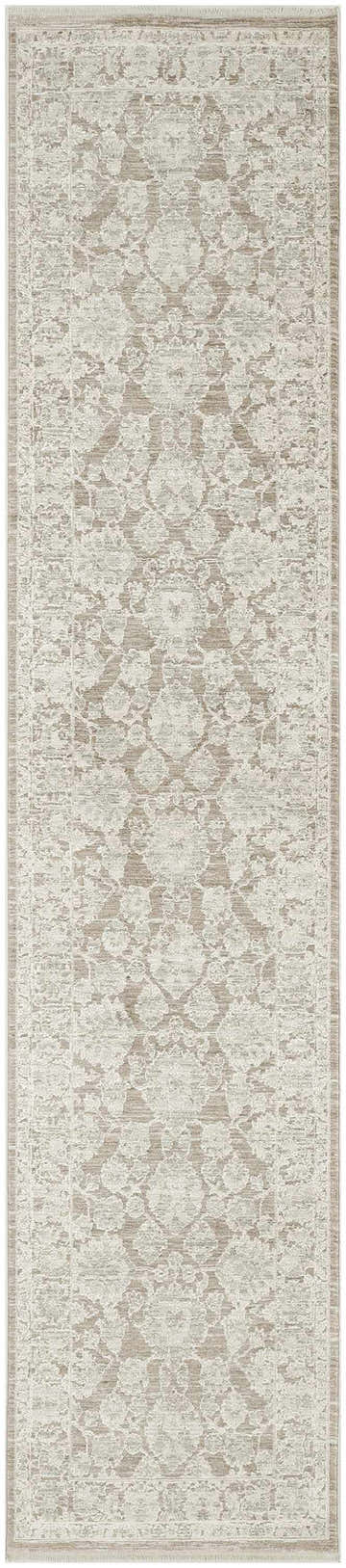 Close-up of the Nourison Shadows Ivory Mocha Vintage Indoor Area Rug, showcasing its floral pattern and chestnut color.
