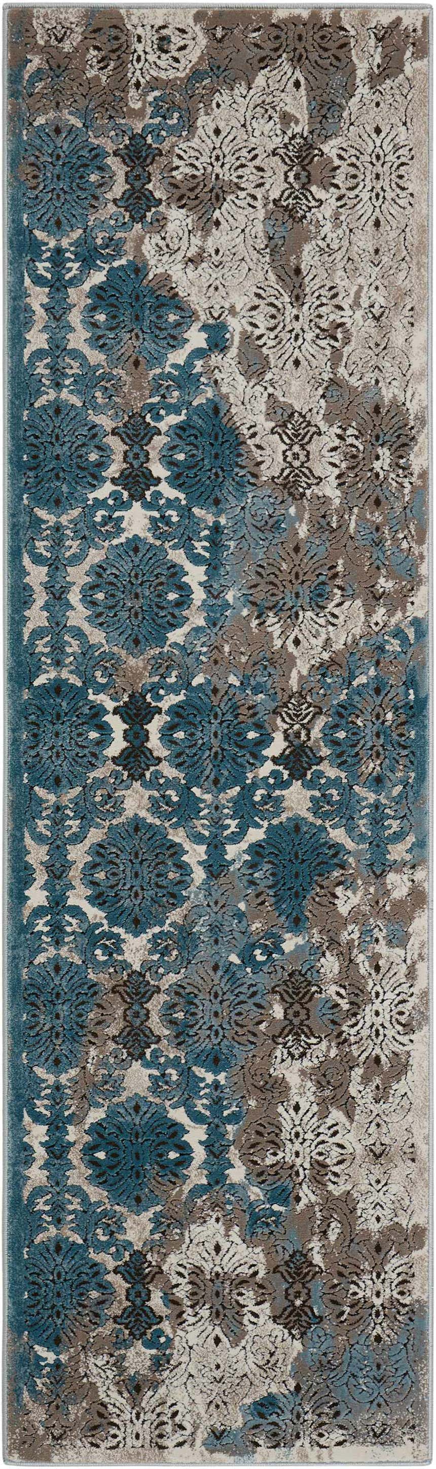Close-up of the Nourison Karma Ivory/Blue Vintage Area Rug. Features a floral, distressed pattern in blue, chestnut, and ivory tones.