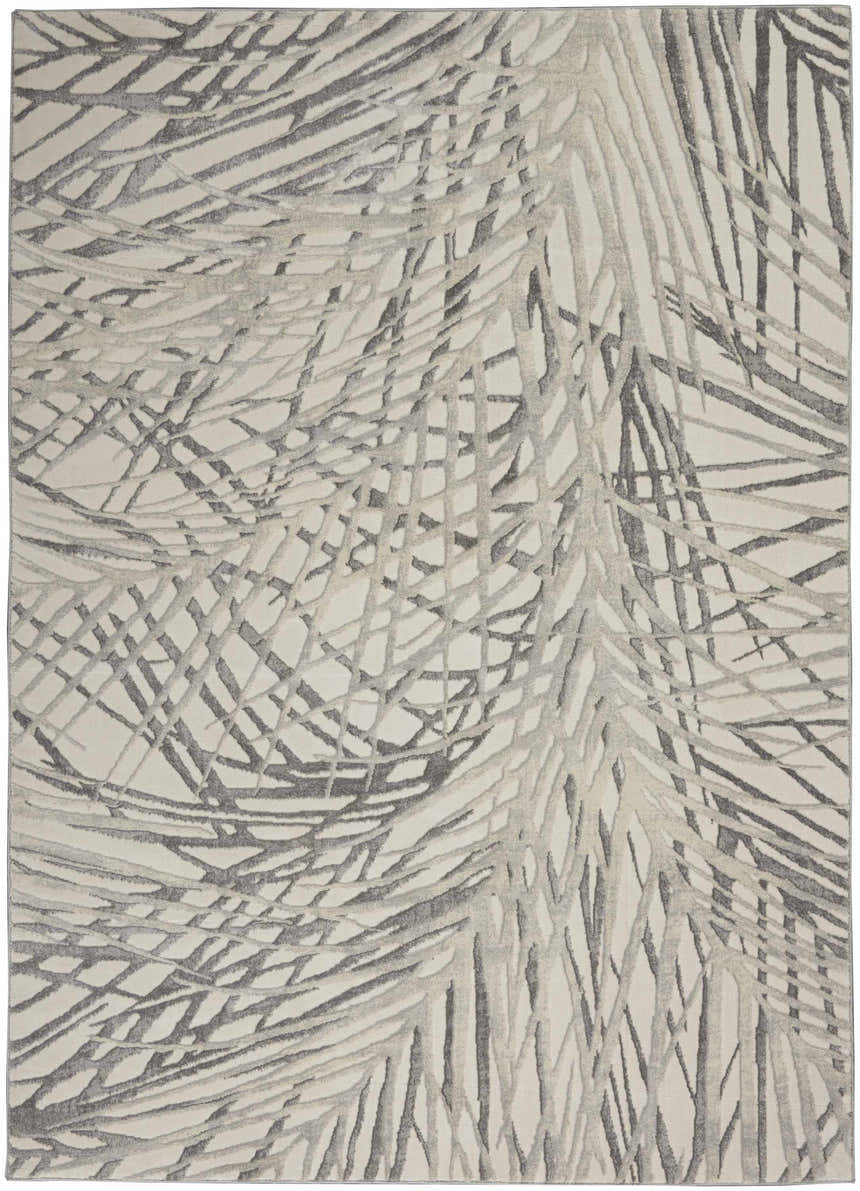 Close up of Nourison Rustic Textures Ivory/Grey Area Rug featuring a modern, abstract branch-like pattern.