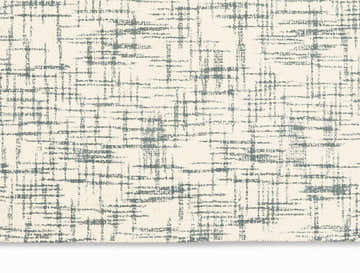 Close-up of the Calvin Klein Tucson Ivory/Light Grey rug. Handmade wool rug with a modern, abstract grid pattern.