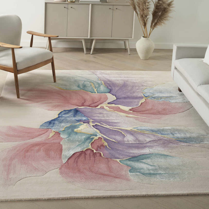 Living room scene with a Nourison Prismatic Ivory rug, featuring chestnut, pink, blue, and purple floral design. Mid-century modern style.