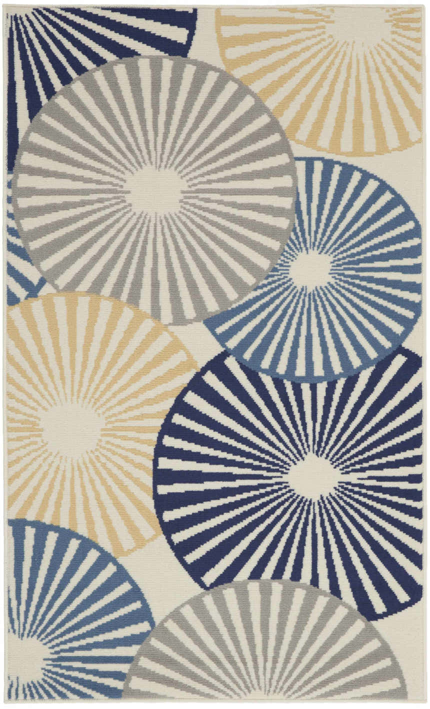 Nourison Grafix White rug close-up showing geometric circle pattern in off-white, blue, gray, and yellow. Contemporary style.