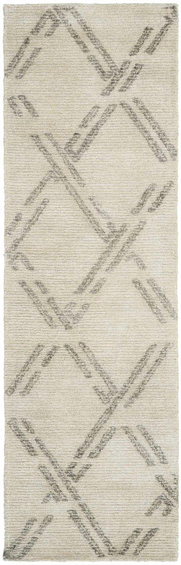 Close-up of Nourison Venosa Ivory/Grey rug. Mid-century modern design with a geometric pattern and jute/rayon texture.