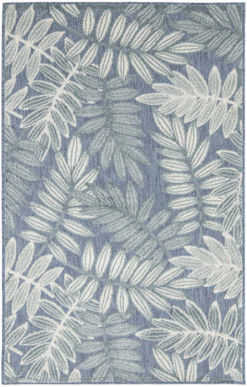 Close-up of the Nourison Aloha Blue rug featuring a light blue background and a leafy pattern.