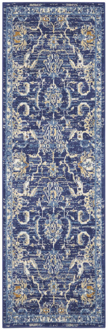 Close-up of Nourison Grafix Navy Vintage Area Rug. Distressed floral pattern in navy, blue, and beige tones.