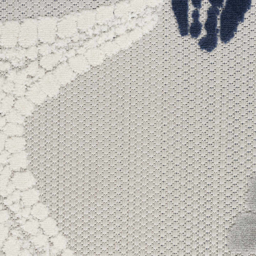 Close-up of the Nourison Aloha Grey Multicolor rug showing its textured weave and coastal-inspired pattern.