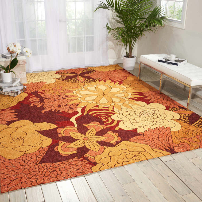 Bright living room with Spice Nourison South Beach Area Rug. Floral pattern in spice tones on a light wood floor.