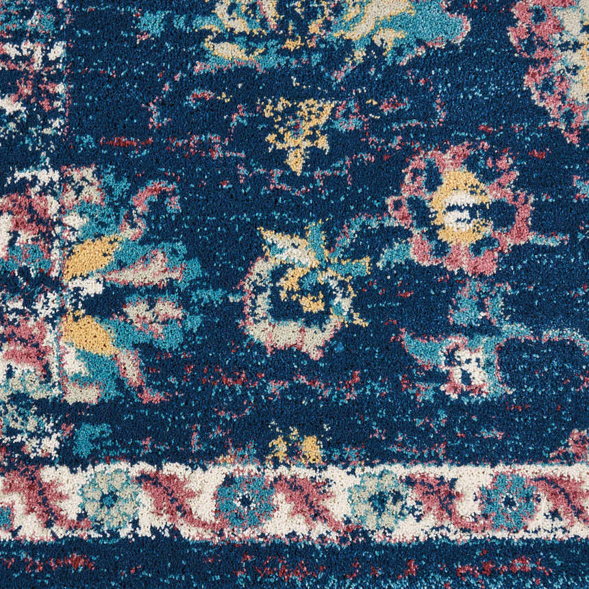 Close-up of the Nourison Fusion Navy Pink Persian rug showing its detailed floral pattern and texture.