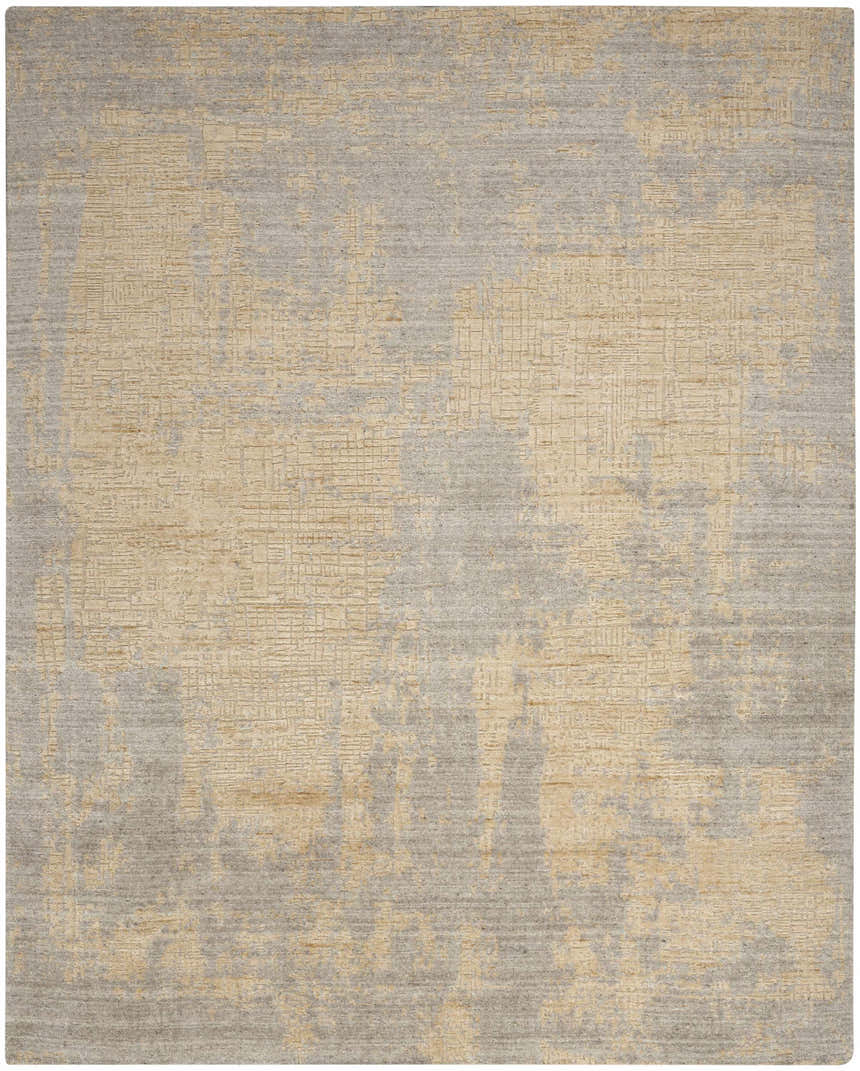 Close-up of Nourison Harmony Grey Gold rug. Modern design with abstract gold pattern on a textured gray wool blend.