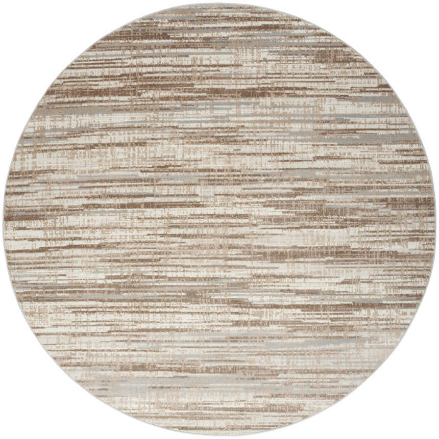 Close-up of round Nourison Elation Ivory Grey rug. Modern design with chestnut brown and gray horizontal lines. High pile texture.