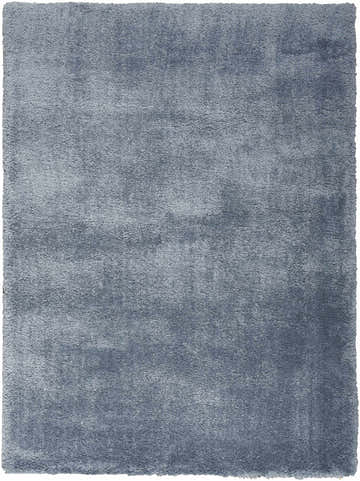 Close-up of the plush Nourison Dreamy Shag Light Blue rug. Soft, dense shag texture in a solid, calming light blue hue.