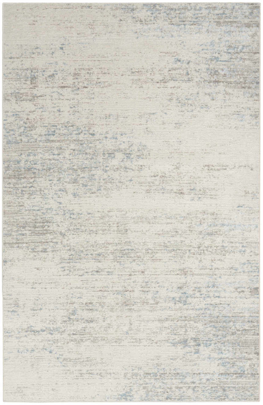 Close-up of Calvin Klein CK029 Captivating Cream Blue rug. Mid-century modern style with abstract cream, blue, and beige pattern.