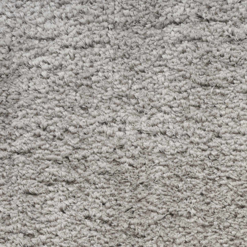 Close-up of the plush Nourison Dreamy Shag Silver Gray rug, showing its soft, textured shag pile.