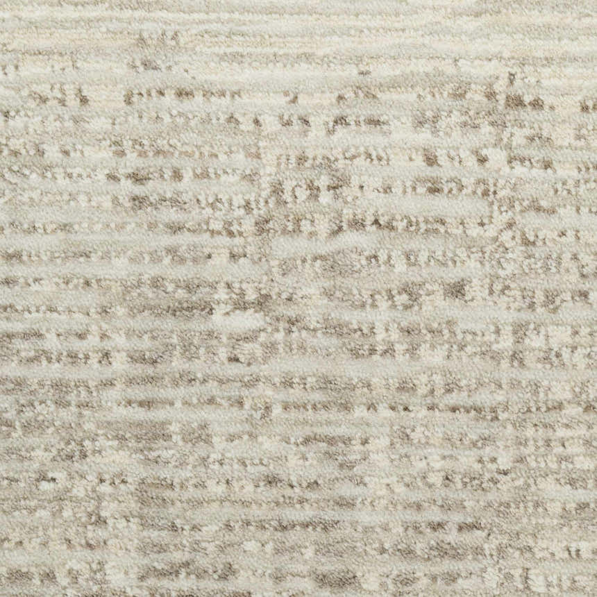 Close-up of Calvin Klein CK079 Notes Ivory Grey Rug. Abstract pattern with ivory and chestnut hues. Soft pile texture.