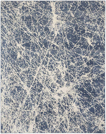 Close-up of the Nourison Exhale Navy Ivory area rug, featuring a high-pile, mid-century modern design.