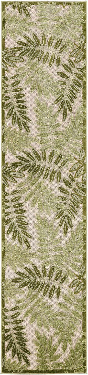 Close-up of Nourison Aloha Ivory Green Outdoor Area Rug featuring a leafy green pattern on a neutral background.