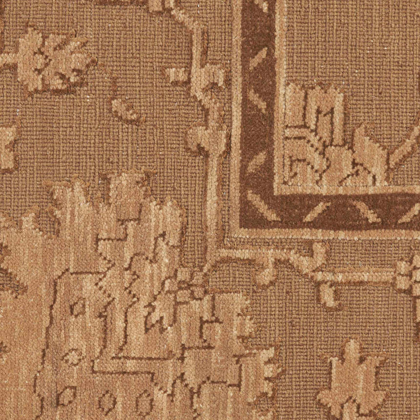 Close-up of the vintage design and texture of the Nourison Silk Pointe Brown Area Rug, handmade with New Zealand wool.