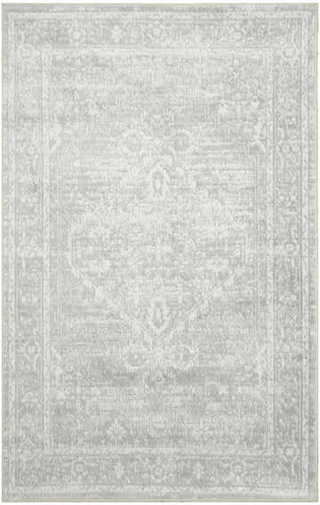 Close-up of a Nourison Astra Light Grey Vintage Area Rug. Machine-made with a subtle, distressed traditional pattern.