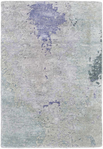Close-up of the Nourison Silk Shadows Blue Green rug. Abstract design in shades of blue, green, and gray. Soft, silk-like texture.
