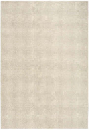 Close-up of the DKNY Atlantic Avenue beige rug. High pile texture with a subtle, modern pattern.