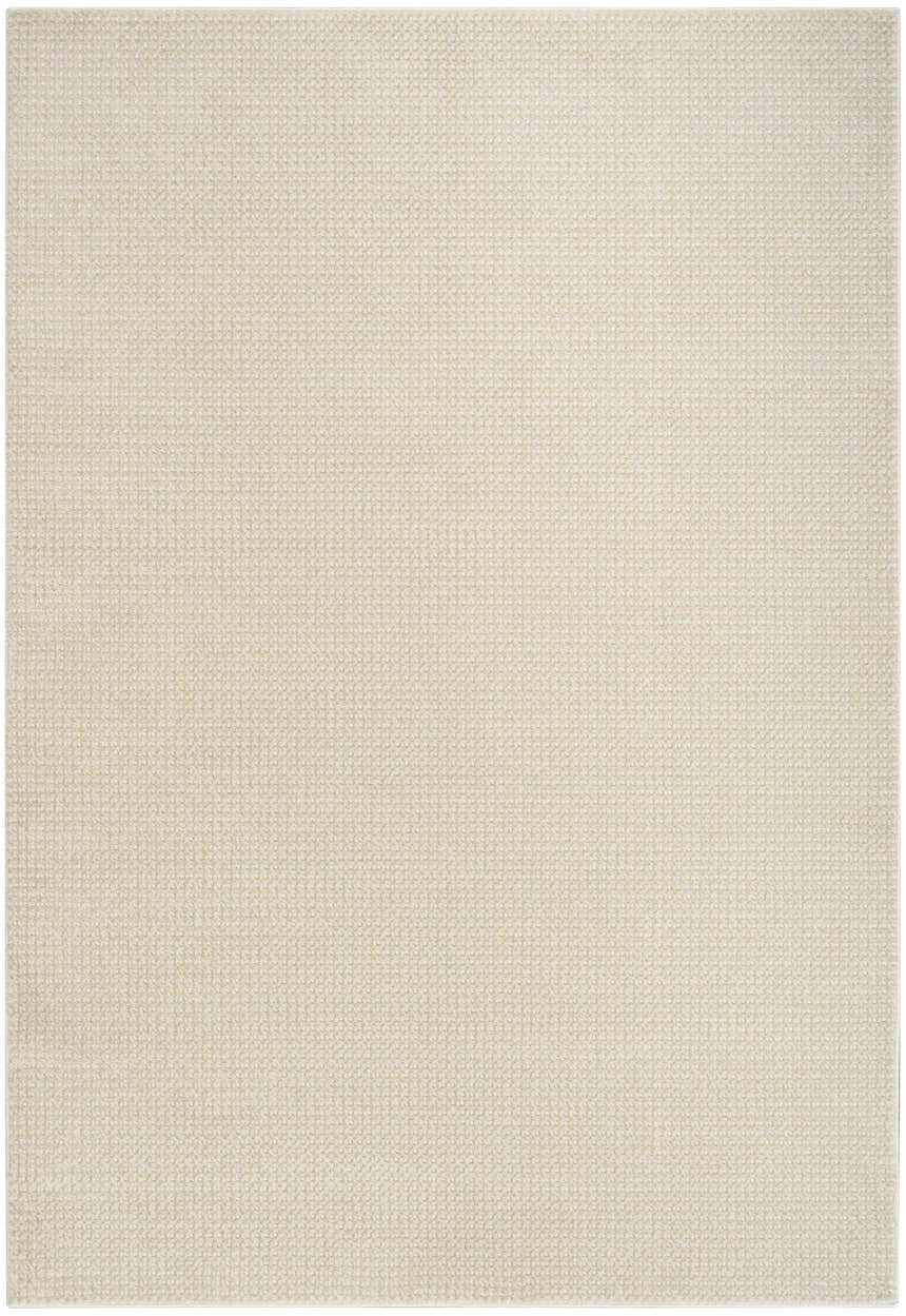 Close-up of the DKNY Atlantic Avenue beige rug. High pile texture with a subtle, modern pattern.
