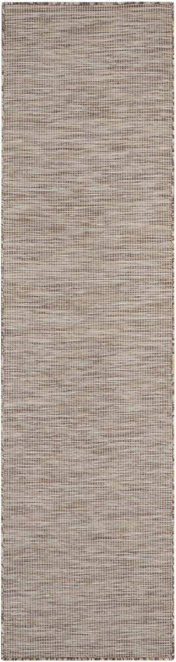 Close-up of the Nourison Positano Beige Modern Area Rug, showing its woven texture and neutral color palette.
