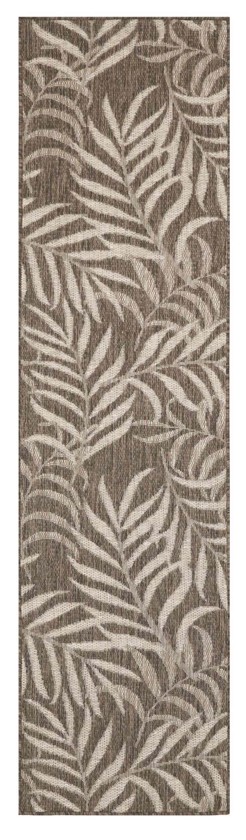 Close-up of Nourison Garden Oasis Mocha Tropical Area Rug. Light brown rug with a tropical leaf pattern.