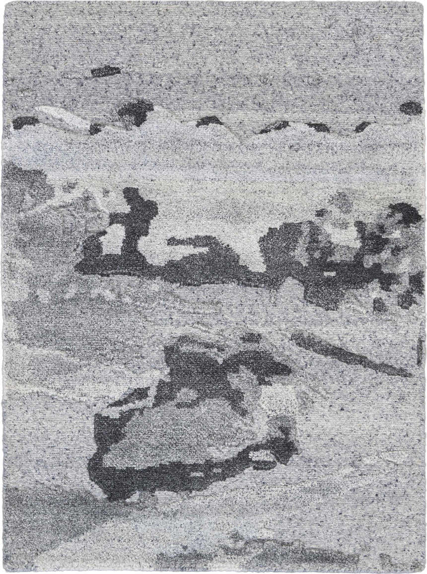 Close-up of the Nourison Divine Smoke Rug, a gray mid-century modern rug with abstract black pattern and handmade texture.