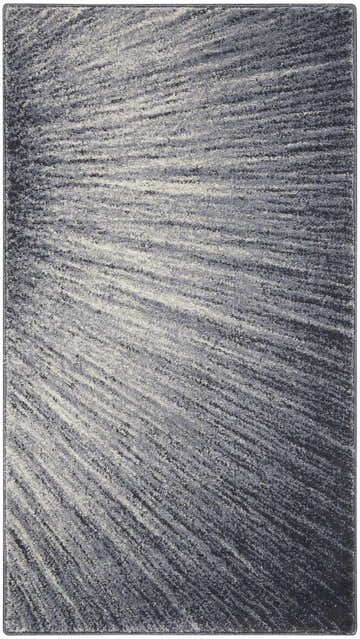 Close-up of the Nourison Moroccan Celebration Blue Grey rug, featuring a modern, abstract, striated pattern and soft texture.