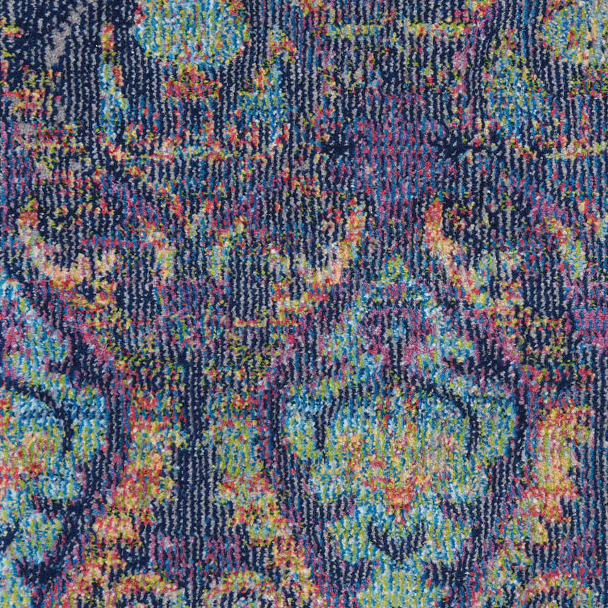 Close-up of the Nourison Ankara Global Navy Multicolor rug, showing its bohemian pattern and texture.