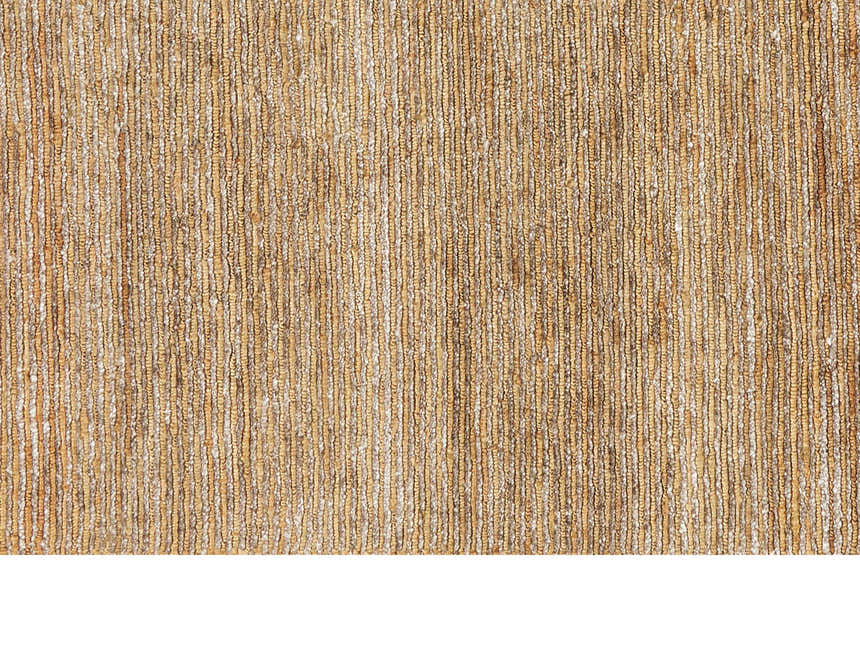 Close-up of the Calvin Klein Mesa Fossil Rug showing its textured, vertical stripes in shades of tan and cream.