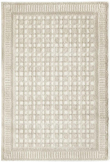 Close-up of the Nourison Nordic Ivory rug, a machine-made pile rug with a subtle chestnut grid pattern and textured border.