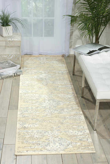 Entryway with Nourison Luminance Bone Vintage rug, white bench, sheer curtains, and light wood floors.