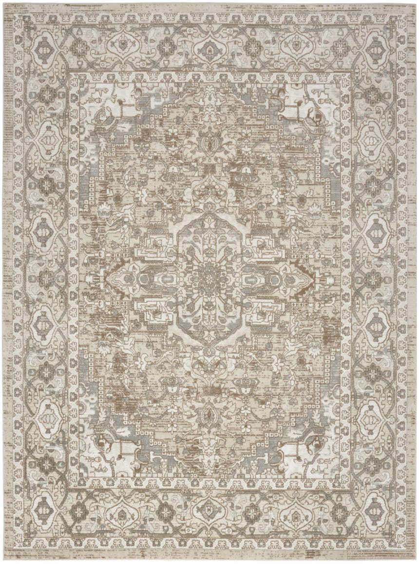 Close-up of the Nourison Quarry Beige Vintage Indoor Area Rug, featuring a traditional, distressed pattern and high pile.