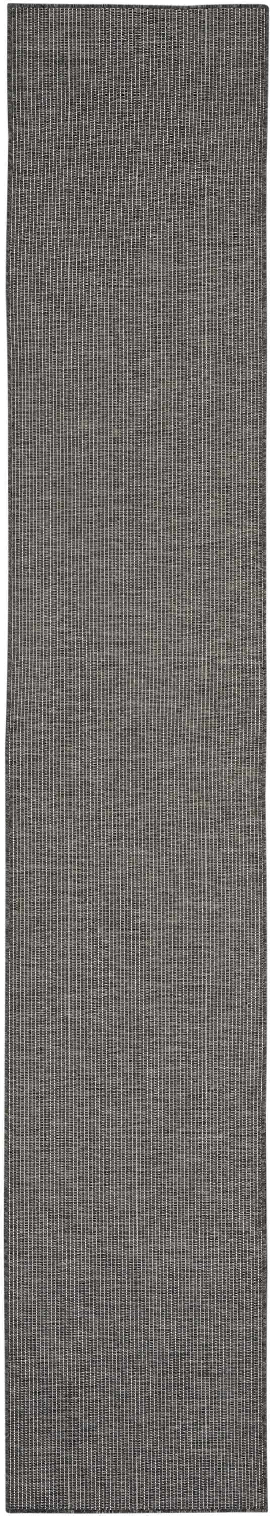Close-up of Nourison Positano Charcoal Modern Area Rug. Taupe and charcoal vertical stripes create a textured, mid-century modern design.