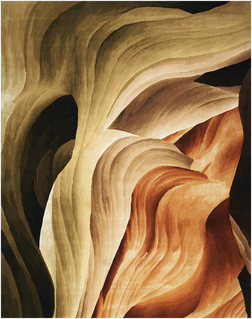 Close-up of the Nourison Prismatic Multicolor rug, showcasing its abstract, flowing design in shades of tan, brown, and black.