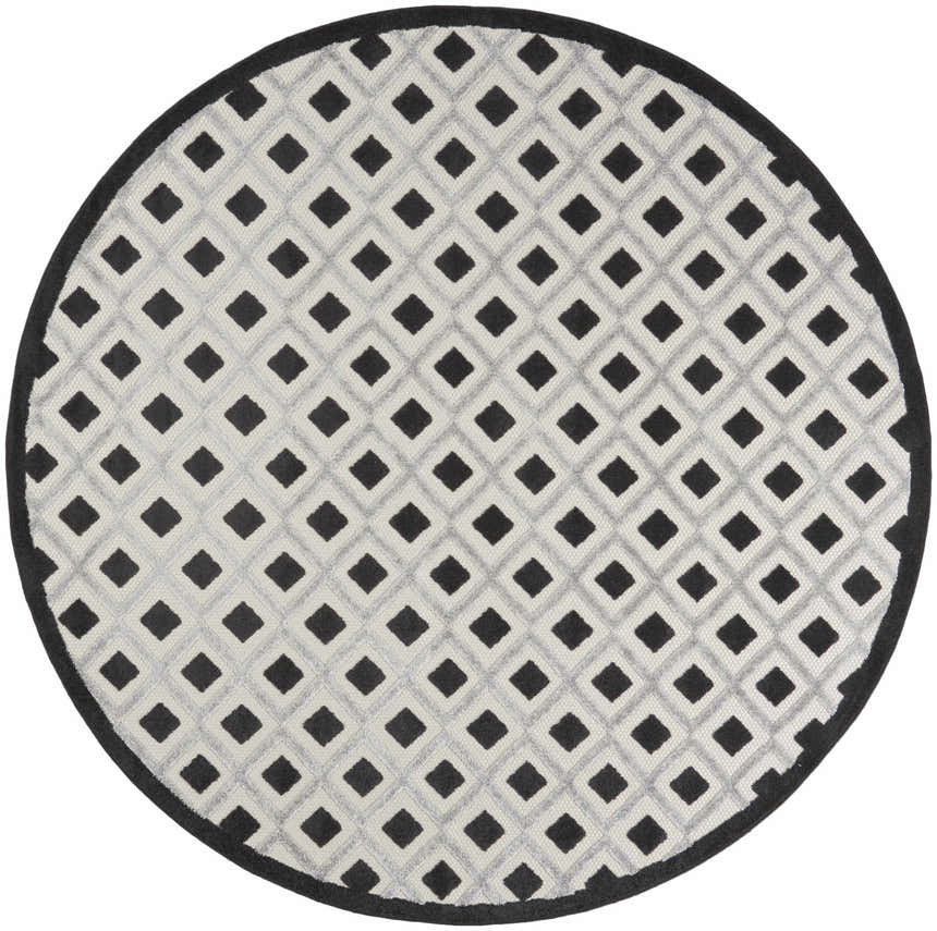 Round Nourison Aloha Black White Area Rug featuring a diamond pattern and black border.