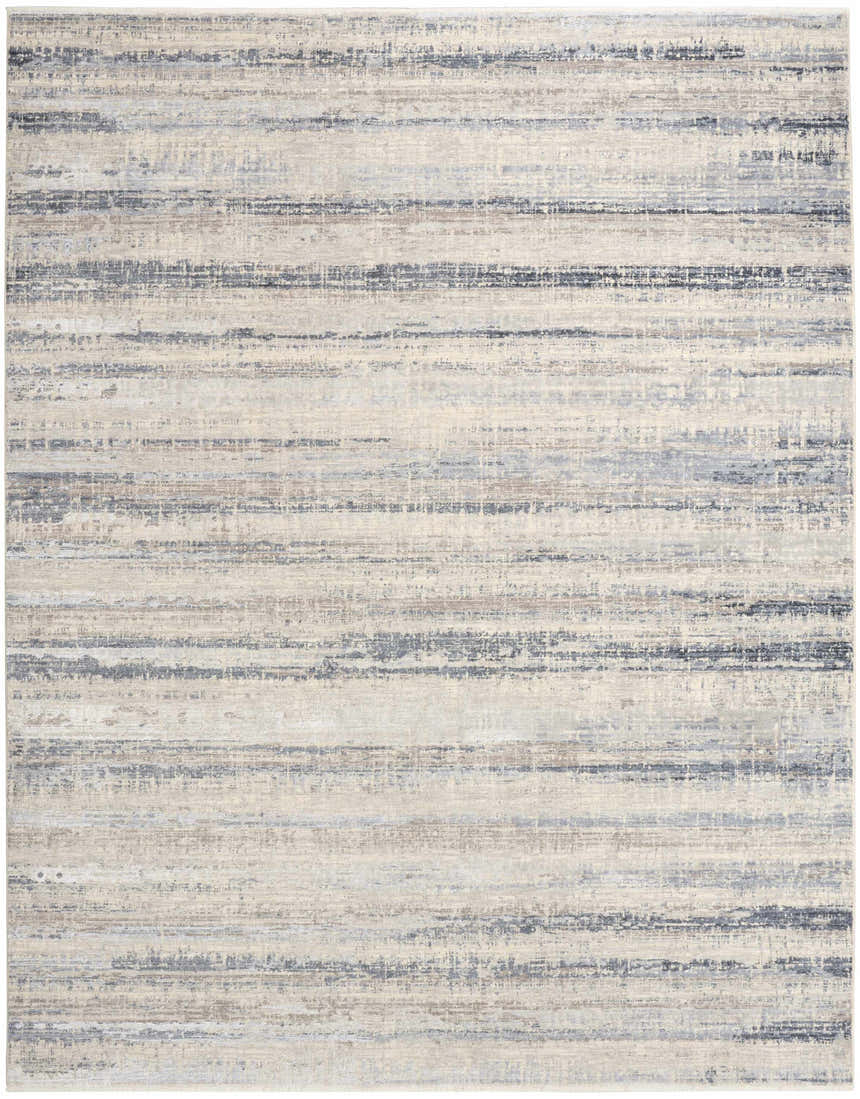 Close-up of the Calvin Klein CK089 Drift Blue Rug. Light blue, gray, and beige horizontal stripes create a modern, textured design.