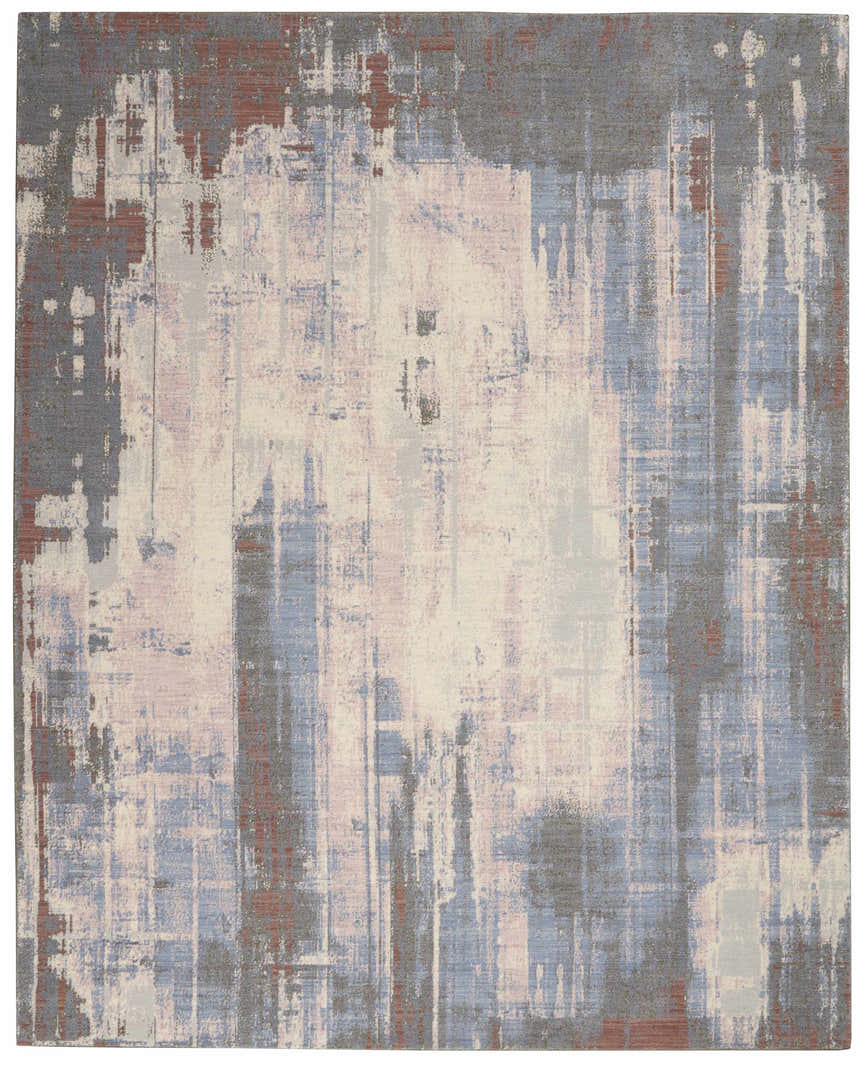 Multicolor Nourison Artworks rug with a modern abstract design in shades of gray, blue, pink, and rust.