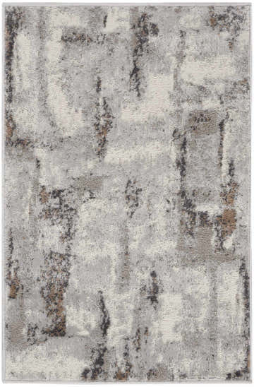 Close-up of the high-pile Nourison Elation Grey Ivory area rug with a modern abstract design and chestnut accents.