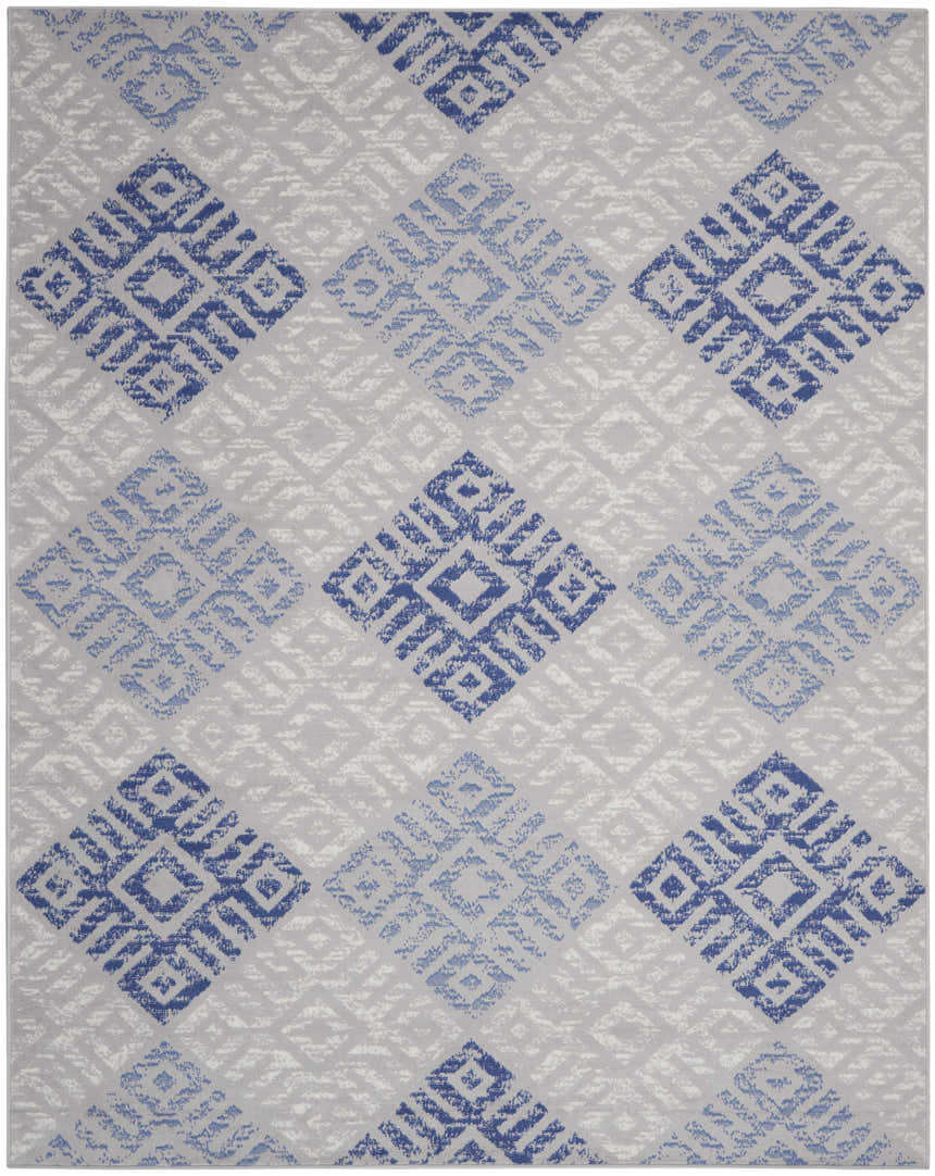 Close-up of Nourison Whimsicle Grey Blue Bohemian Indoor Area Rug with geometric diamond pattern and distressed texture.